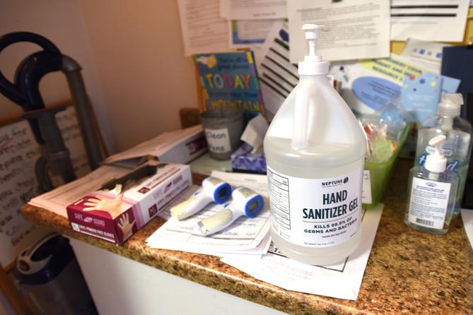 At Boyertown Children's Center, a PPE station is set up near the main entrance.