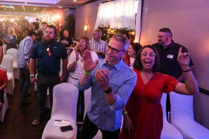 Supporters of Pennsylvania GOP governor candidate Doug Mastriano sing songs of worship before seeing him May 17 at his campaign party in Chambersburg. Supporters of Pennsylvania GOP governor candidate Doug Mastriano sing songs of worship before seeing him May 17 at his campaign party in Chambersburg.