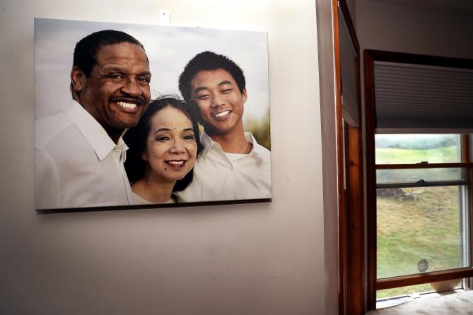 A family photo hangs on a wall in the dining room of Fe and Gareth Hall's home in Stroudsburg. A family photo hangs on a wall in the dining room of Fe and Gareth Hall's home in Stroudsburg.