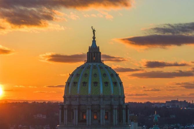 The sun rises over the state Capitol building in Harrisburg, Pennsylvania. The sun rises over the state Capitol building in Harrisburg, Pennsylvania.