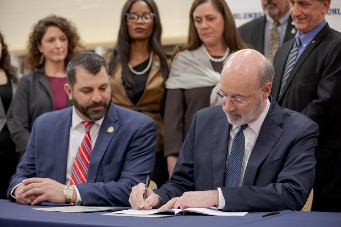 Gov. Tom Wolf (right) signed a bill in 2019 regarding child victims of sex abuse while Mark Rozzi looked on. Gov. Tom Wolf (right) signed a bill in 2019 regarding child victims of sex abuse while Mark Rozzi looked on.