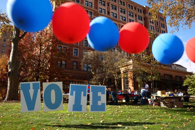Students on the campus of the University of Pittsburgh walk past a ‘vote’ sign on Election Day, Nov. 5., 2024. Students on the campus of the University of Pittsburgh walk past a ‘vote’ sign on Election Day, Nov. 5., 2024.