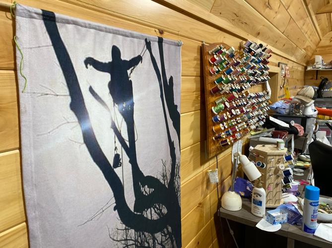 A large piece of fabric, showing Isaiah Compton in a tree, hangs in a backyard shed at Cyndi Compton's Tioga County home. A large piece of fabric, showing Isaiah Compton in a tree, hangs in a backyard shed at Cyndi Compton's Tioga County home.