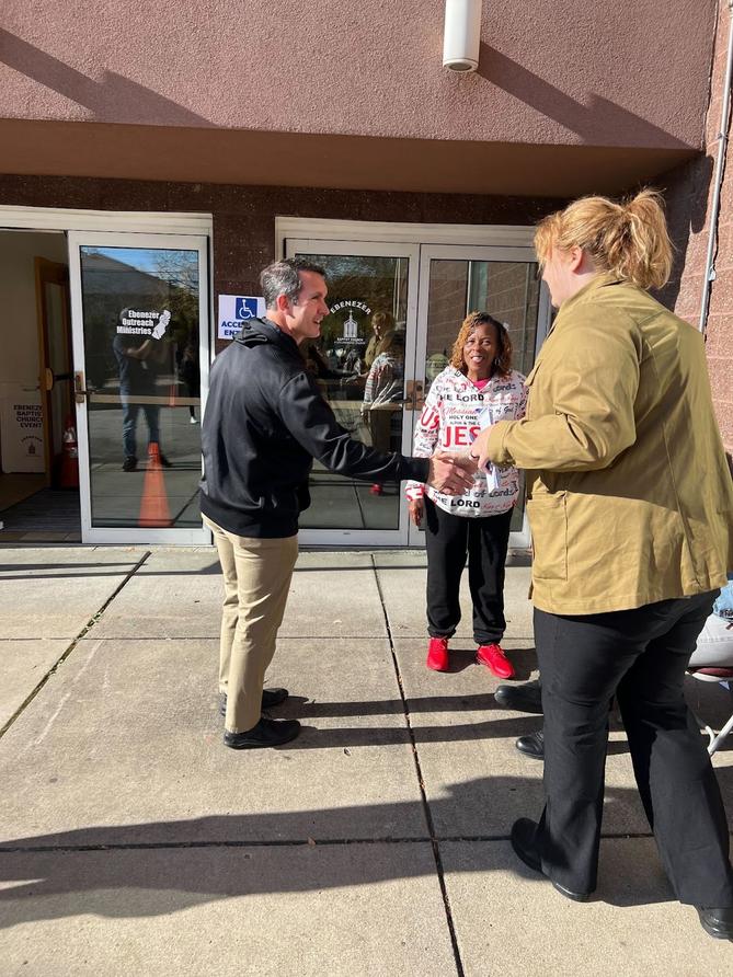 Attorney general candidate Eugene DePasqaule greets voters on Election Day in November 2024. Attorney general candidate Eugene DePasqaule greets voters on Election Day in November 2024.